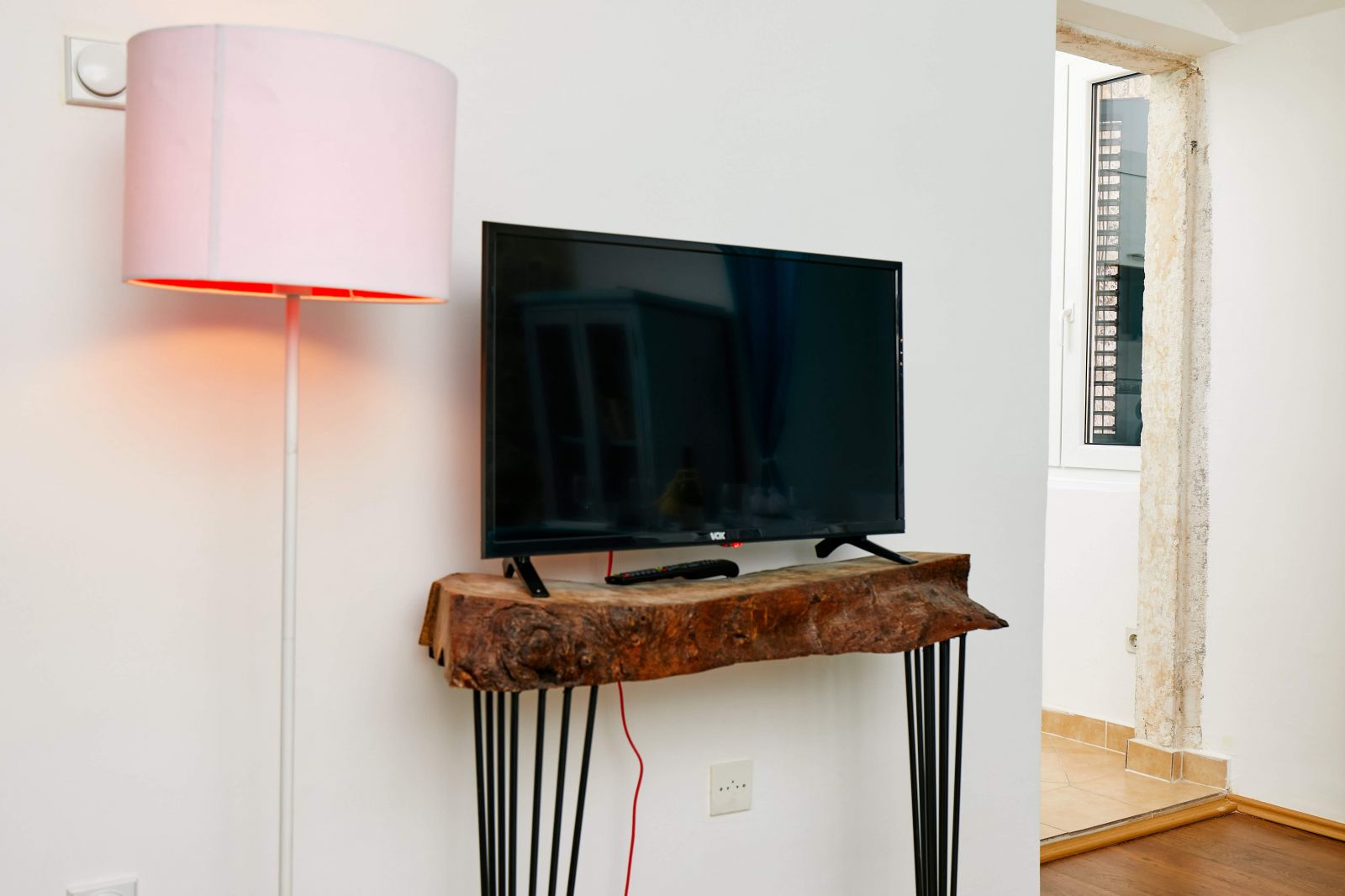 Kotor, Montenegro, flat screen and hand made wood shelf